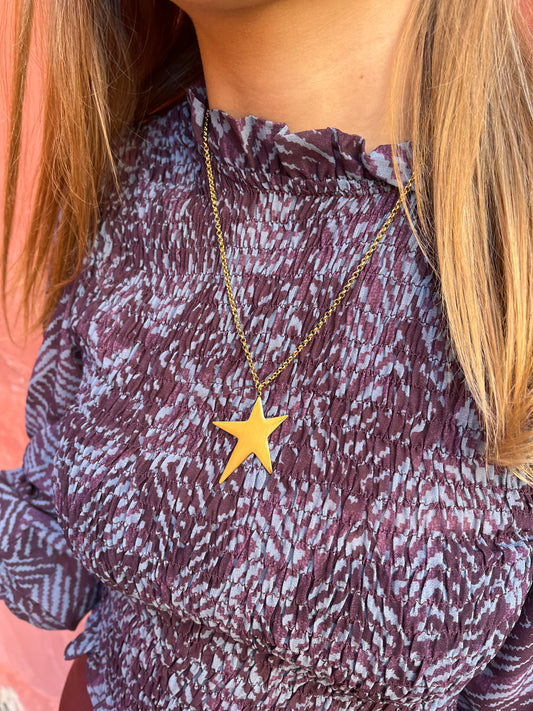 Colgante estrella dorado