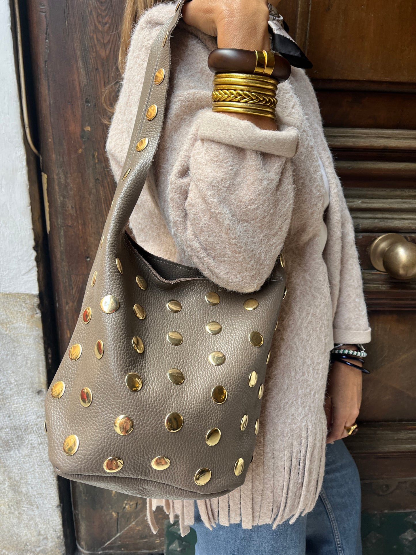 Bolso piel tachuelas