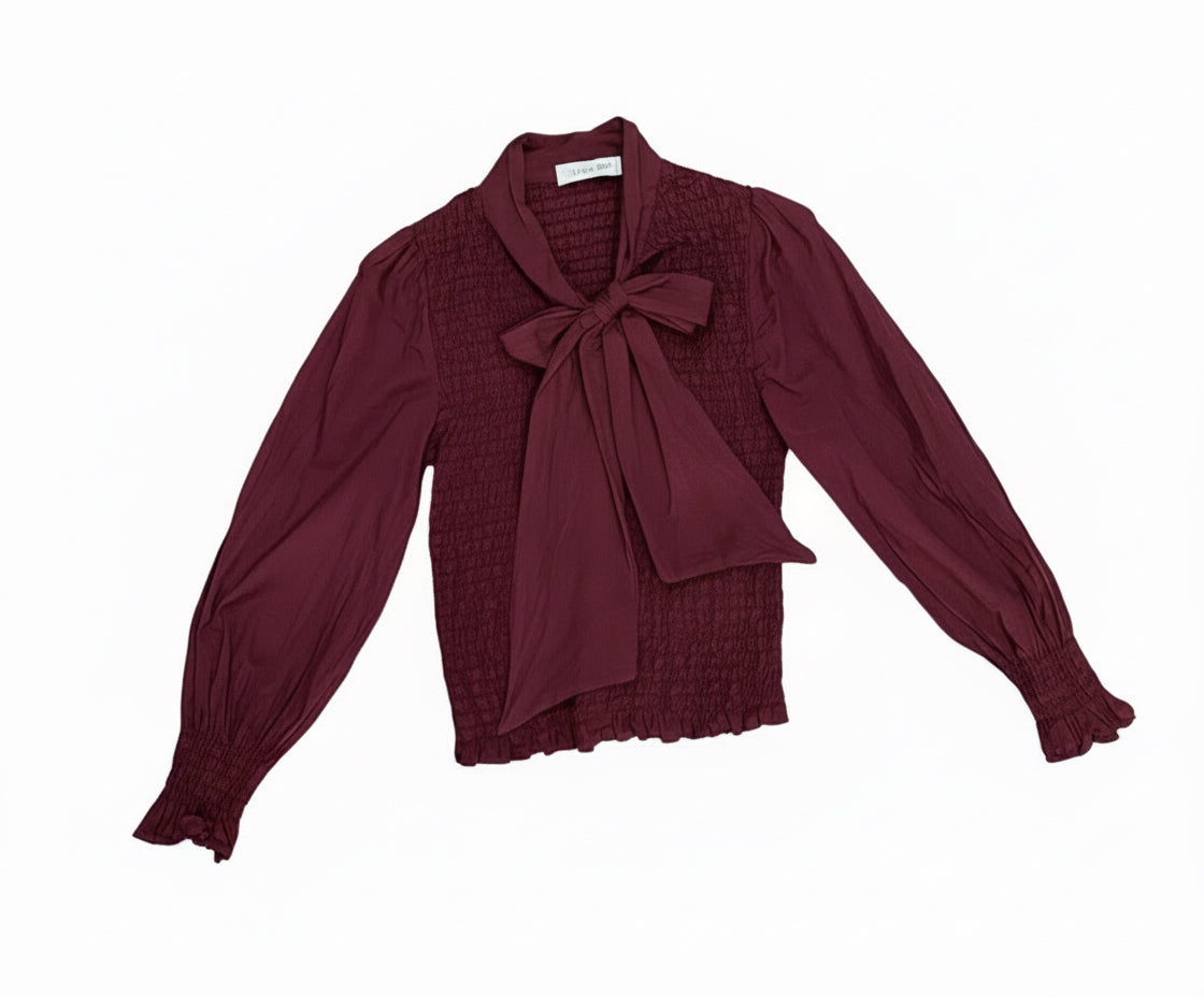 Camisa fruncida con lazada