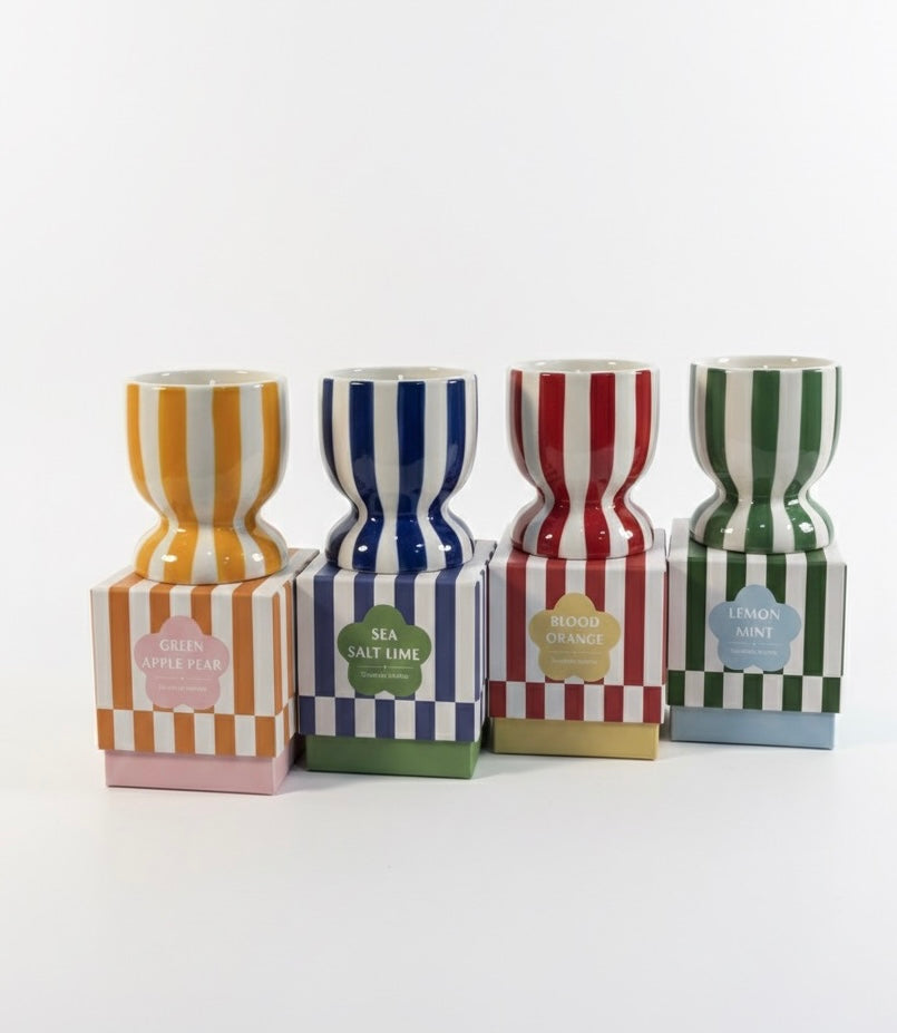Vela aromática con recipiente de cerámica reutilizable