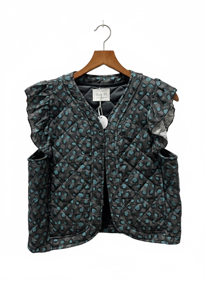 Chaleco animal print con volante