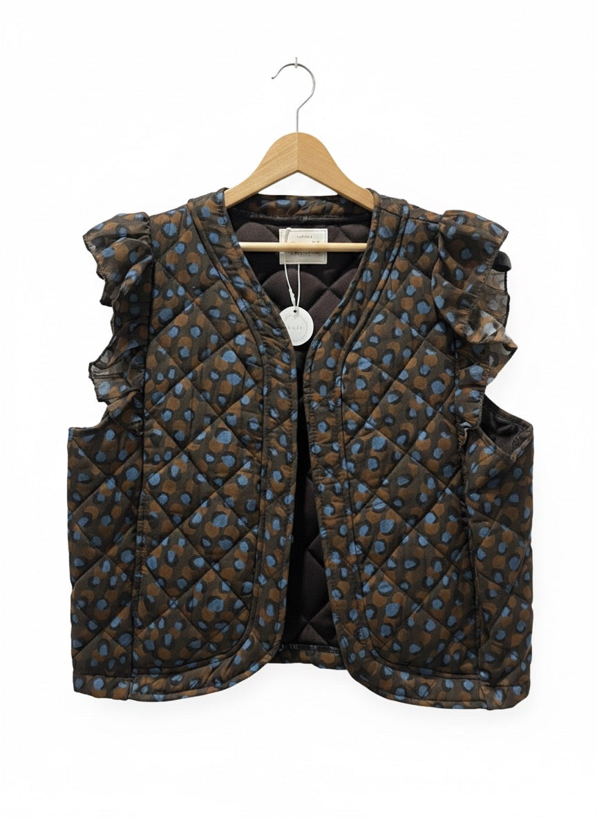 Chaleco animal print con volante