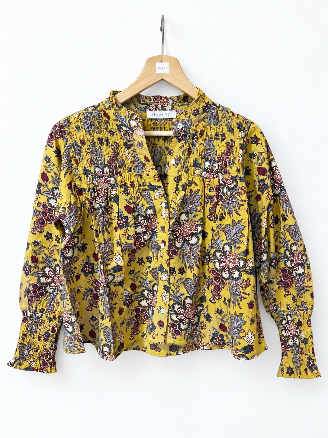 Camisa india flor mostaza  con pechera y puños fruncidos