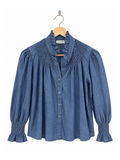 Camisa vaquera con cuello y puños fruncidos