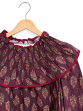 Camisa con cuello y puños fruncidos