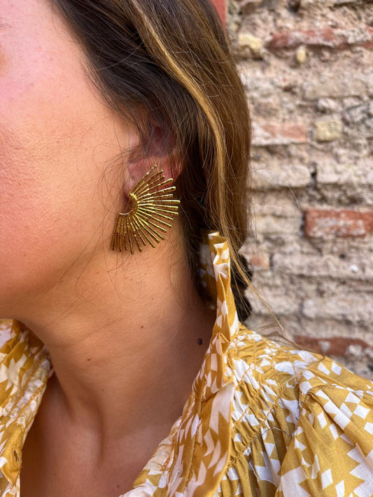 Pendientes medio sol